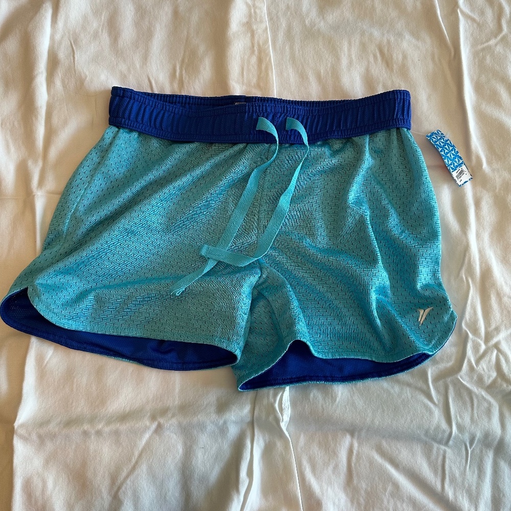 Old Navy girls athletic shorts. Size XL.  New With Tag.  Light blue with bright